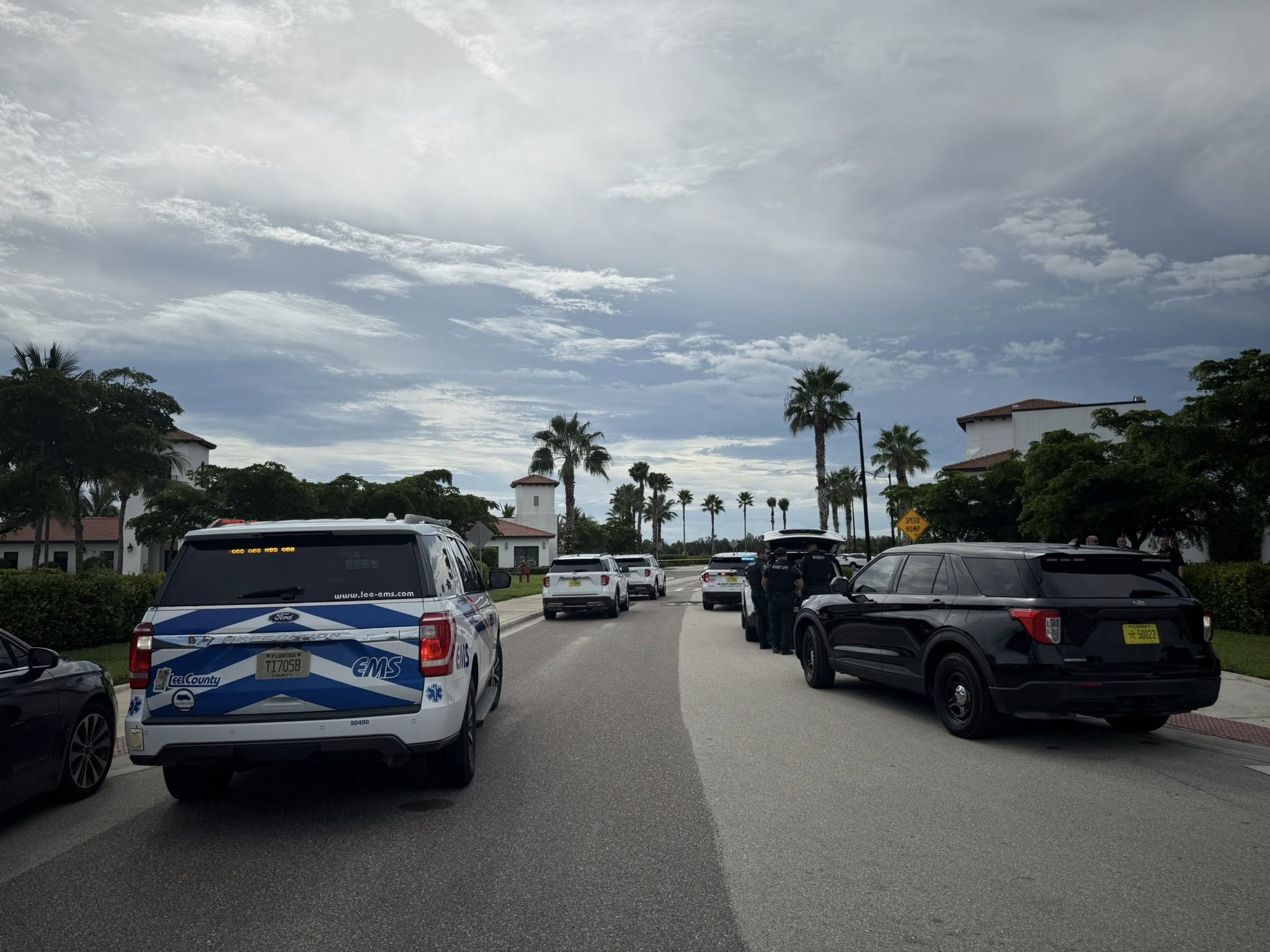 Law enforcement officers and a bomb squad van at the scene of a suspicious package investigation in University Village near Florida Gulf Coast University, Estero, Florida. Credit: Lee County Sheriff's Office